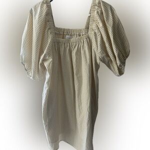 “Things between” baby doll dress
Gingham